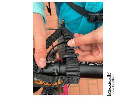 Systém na uchycení tažného lana Kommit Bike Bungee