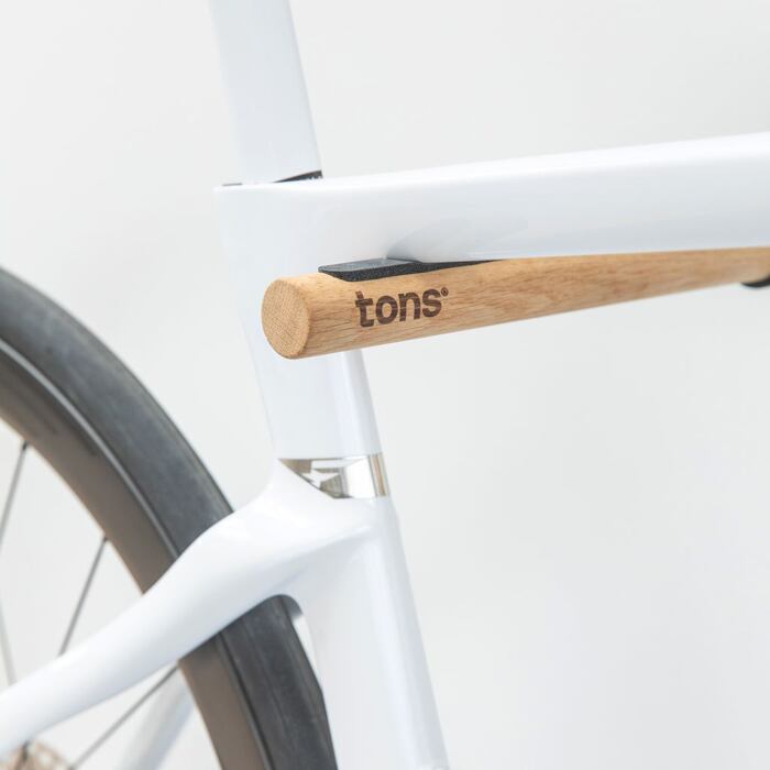 Designový nástěnný držák na kolo Tons